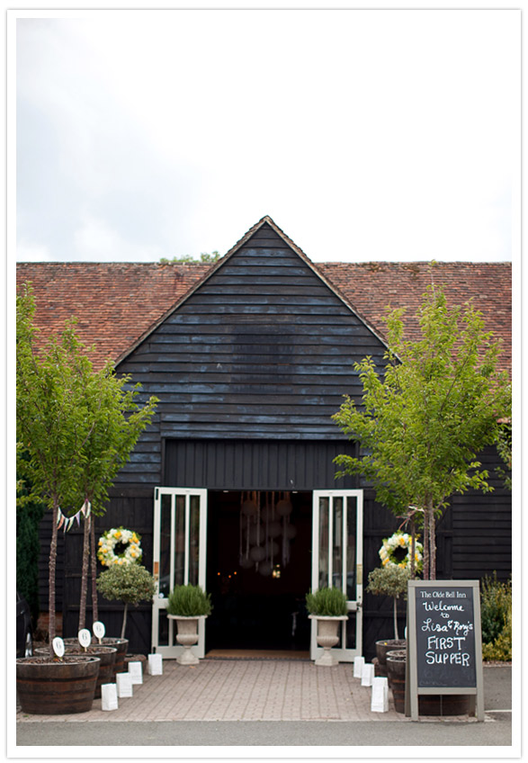 town country wedding reception venue The entrance barn doors were dressed