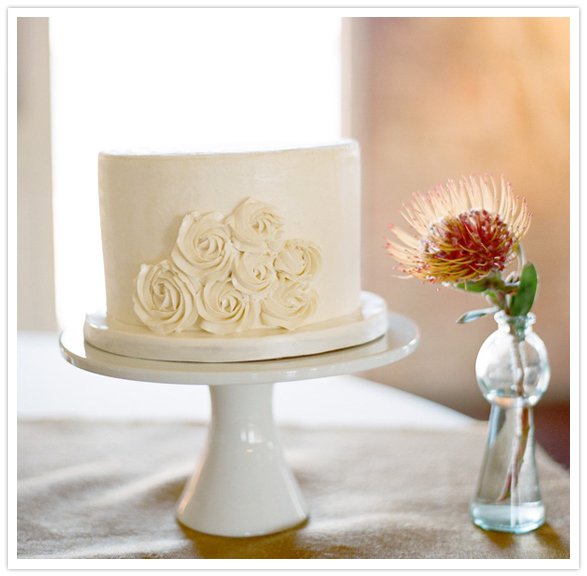 white rosette wedding cake Laura kept costs down by opting to book their