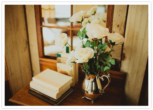 white roses in silver pitcher white roses in silver pitcher