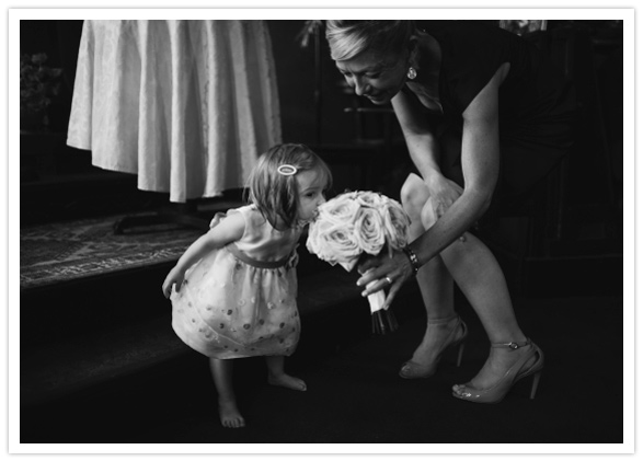flower girl smelling the roses flower girl smelling the roses