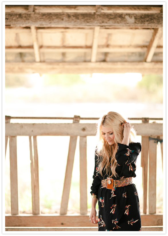 black floral patterned shirt dress and brown leather braided belt