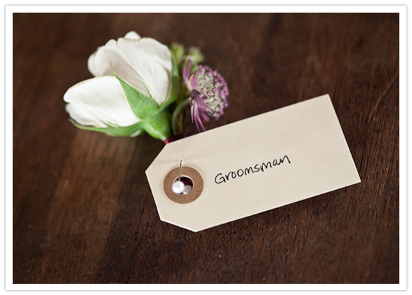 simple white and purple boutonniere simple white and purple boutonniere