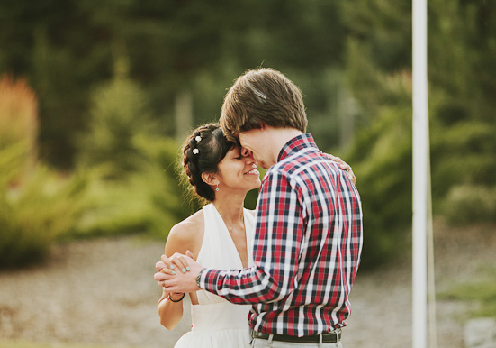 braided hair crown with white flower accents
