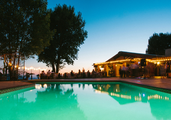 Condor's Nest Ranch poolside wedding reception Condor's Nest Ranch poolside wedding reception