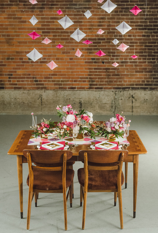 hanging pink and white paper geometric garlands and pink and white florals