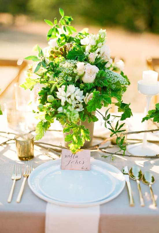 pink ombre place cards, gold flatware and patterned glasses