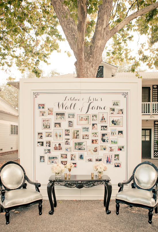 framed bulletin board of family pictures