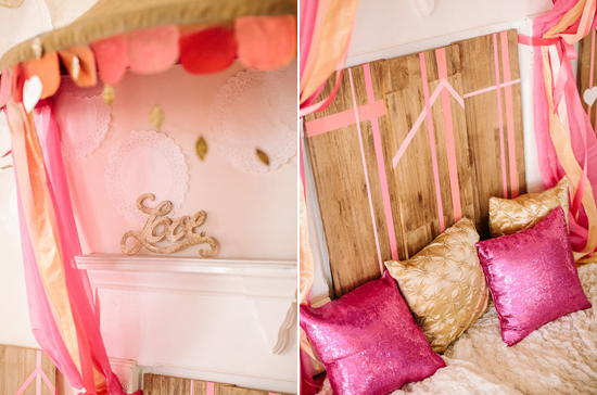 gold glitter "love" sign and pink and gold pillows