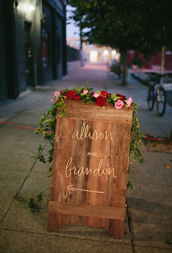 custom wood and flower sign | Photo by Jessica Burke custom wood and flower sign | Photo by Jessica Burke