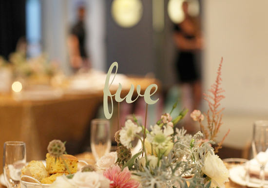 paper cut-out table numbers | Photo by Kimberly Genevieve
