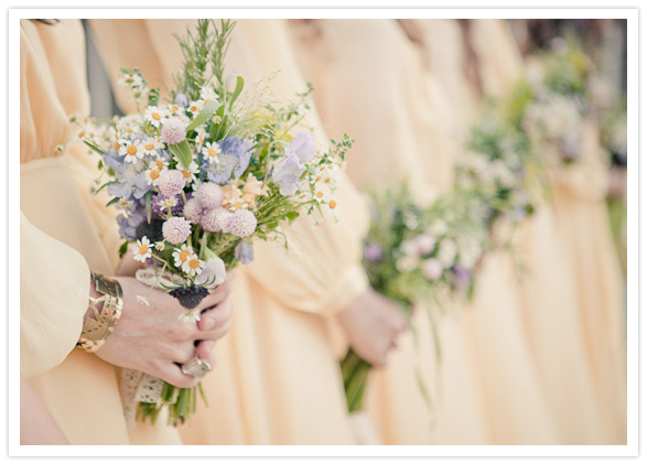light yellow bridesmaid dresses and pastel bouquets