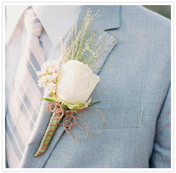 simple white rose boutonniere