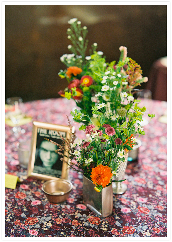 movie-themed table numbers and floral table cloths