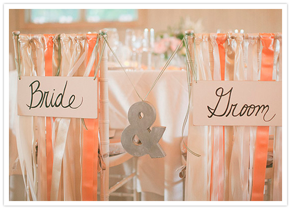 bride and groom streamer chairs