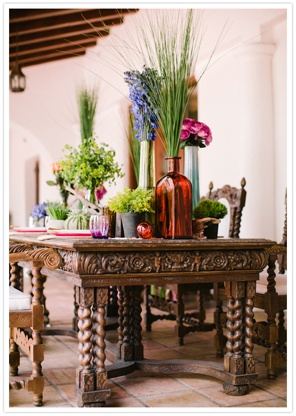 ornate Moroccan style dining table and floral accents