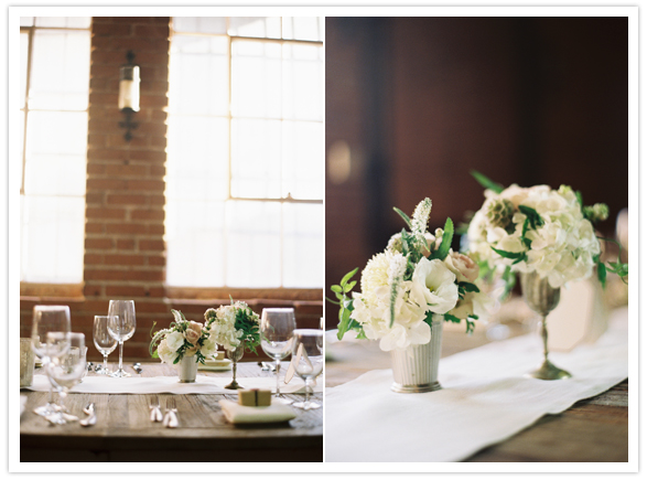 delicate centerpiece urns and white flowers