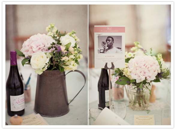delicate floral centerpieces of pink and ivory and rustic vases