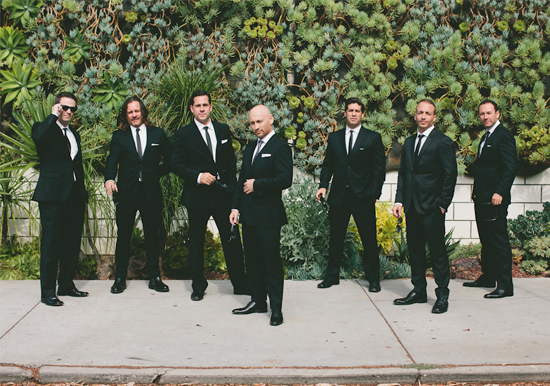 black suited groomsmen