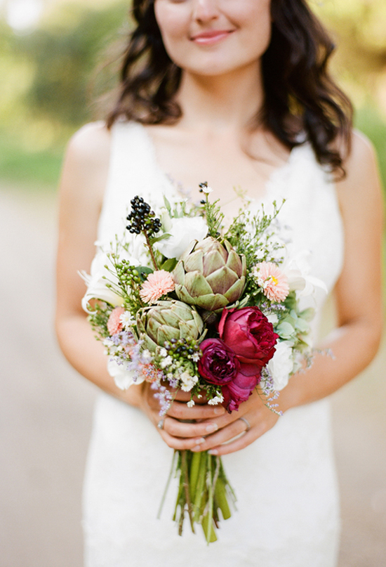 Wild flowers, berries and artichokes bouquet