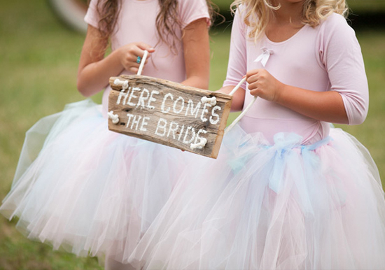 "here comes the bride" wooden sign and tutu flower girls
