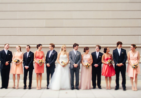 peach and coral bridesmaid dresses and black groom's suits