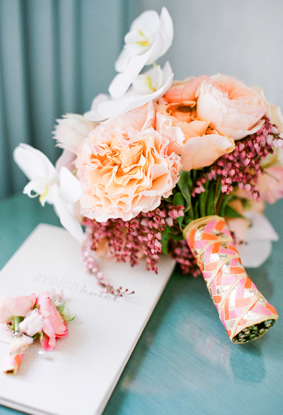 peach and pink ribbon-wrapped bouquet | Photo by Nancy Neil