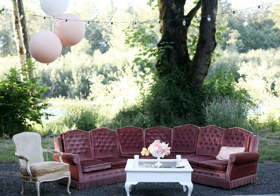 red velvet and pink balloons seating area | Photo by Anne Nunn Photography