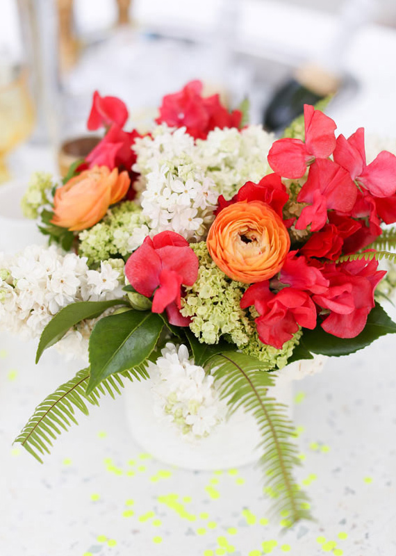 orange and red ranunculus centerpiece  | Photos by Birds of a Feather | 100 Layer Cake
