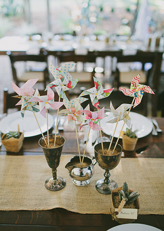 Pinwheel reception decor | photo by Amber Vickery Photography | 100 Layer Cake