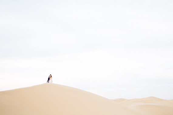 Sand Dune engagement shoot | Photos by Max and Friends | Read more - http://www.100layercake.com/blog/?p=75660