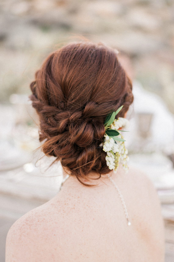 Braided chignon bridal hair| Photo by  Whiskers and Willow Photography  | Read more -  http://www.100layercake.com/blog/wp-content/uploads/2015/04/Desert-wedding-inspiration