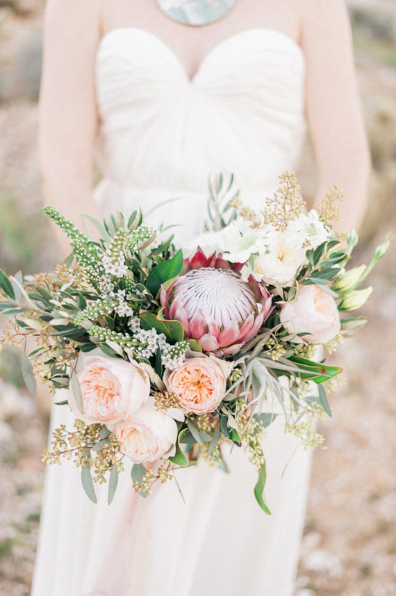 Protea flower bouquet | Photo by  Whiskers and Willow Photography  | Read more -  http://www.100layercake.com/blog/wp-content/uploads/2015/04/Desert-wedding-inspiration