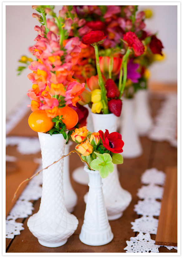 colorful floral and white vase centerpieces