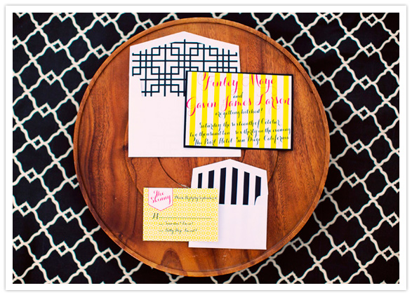 bright yellow and pink with black pattern invitation suite