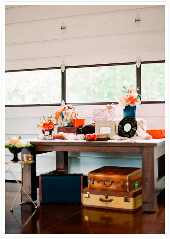 rustic luggage and jean table accents