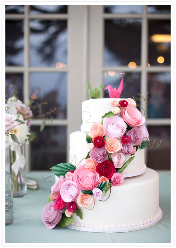 paper flower adorned wedding cake