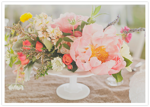 delicate pink and orange floral centerpiece