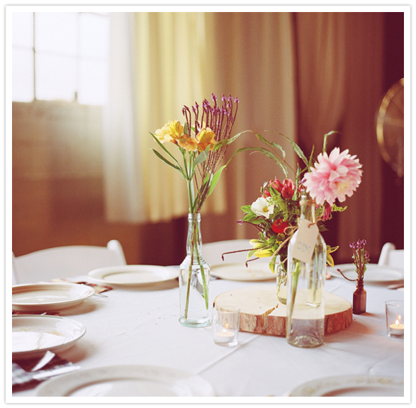 wood block and simple flower vase centerpieces