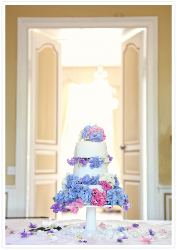 blue, purple and pink floral wedding cake