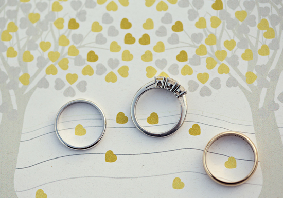tiny wedding heart paper and wedding rings | Photo by Marianne Taylor