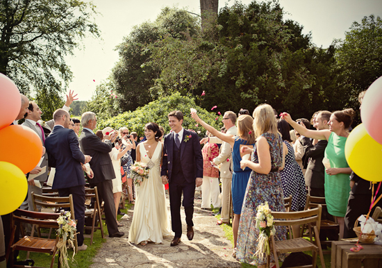 outdoor garden wedding ceremony | Photo by Marianne Taylor