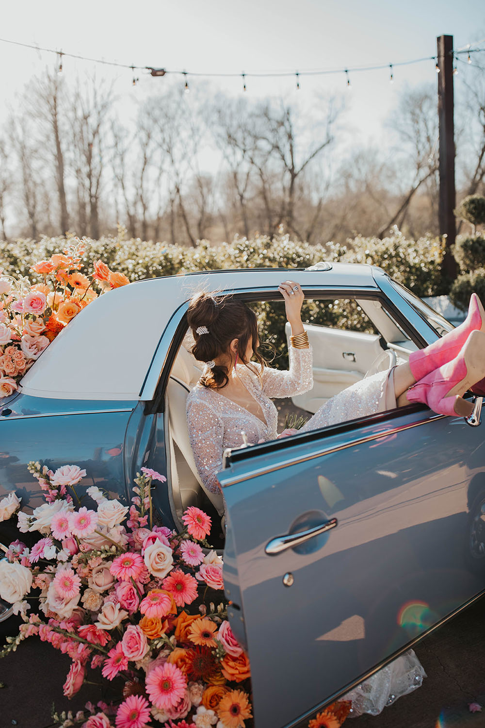 Groovy mod disco-themed wedding overflowing with flowers