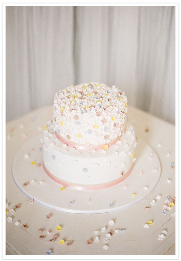 white cake with pastel confetti