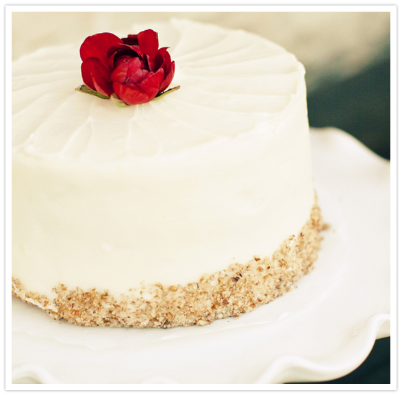 simple white cake with red florals