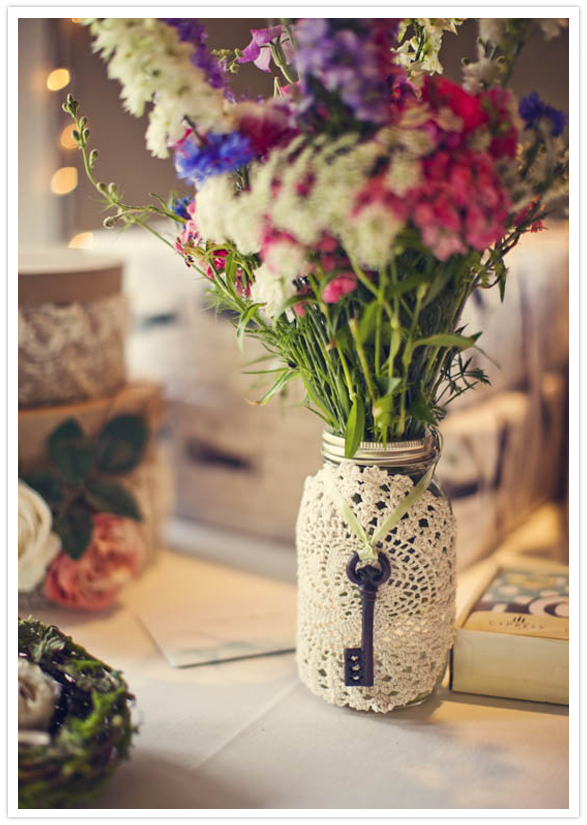 crochet-adorned mason jar vases