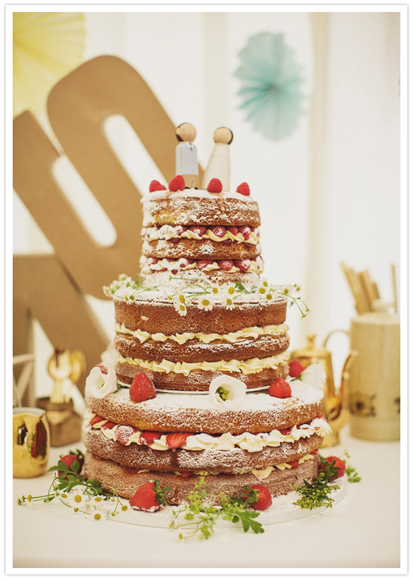 three-tiered, multi-layered powdered wedding cake
