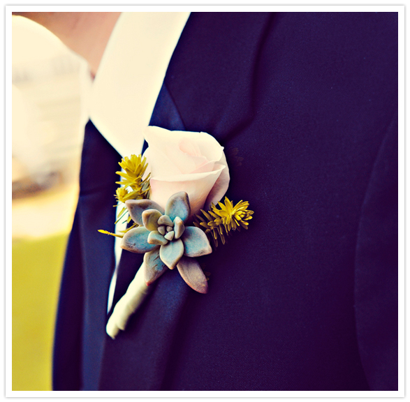white rose and succulent boutonniere 