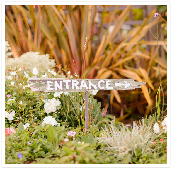 rustic wooden entrance sign