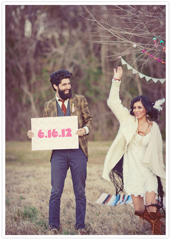 hanging tree garlands and wedding date sign
