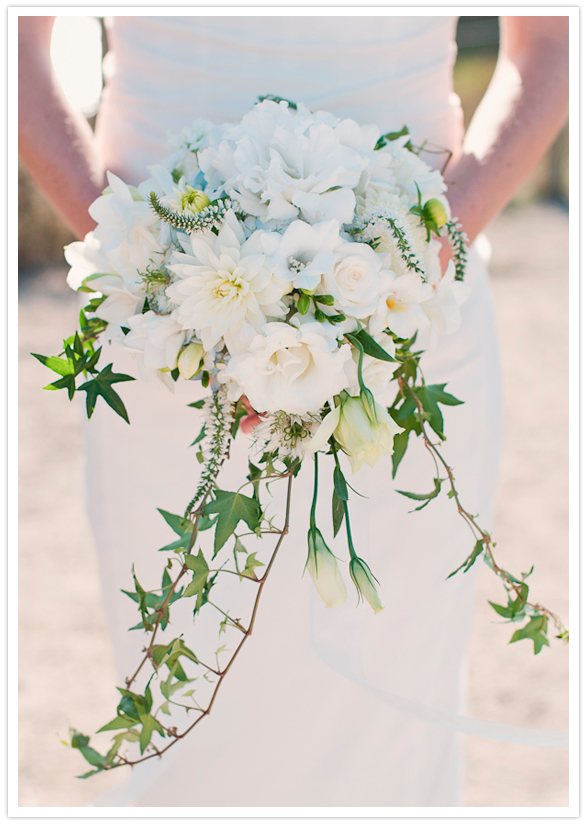 bouquet of white roses, lissianthus, freesia, blue hydrangia and ivy
